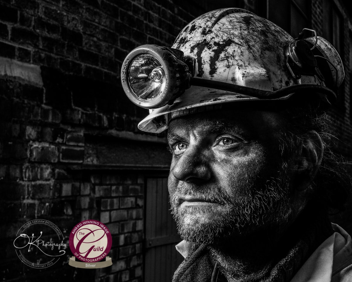 Portrait of a miner in black-and-white