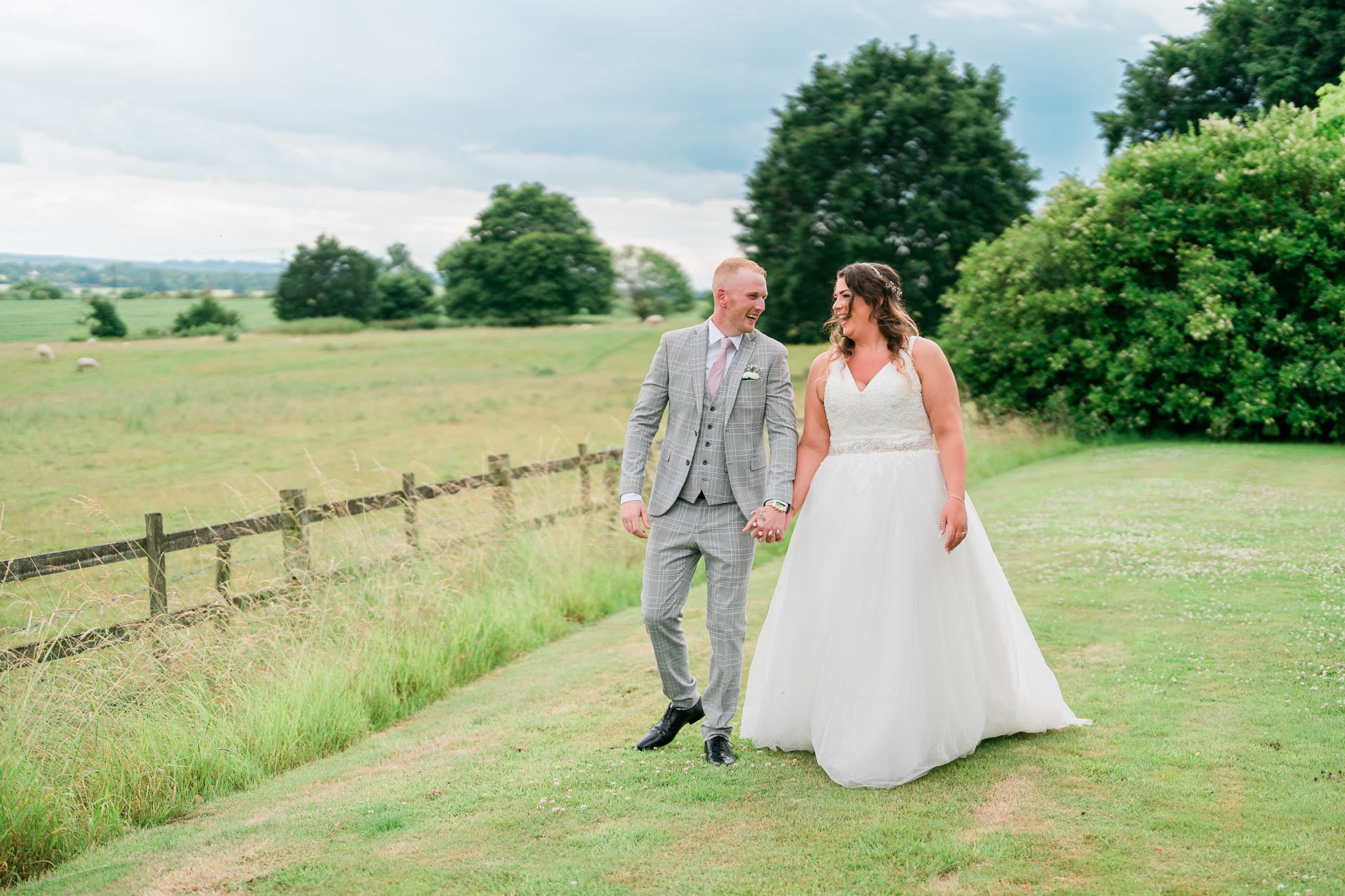 Oliver Kershaw's intimate and personalized approach to wedding photography captures the bride's happy tears as she reads a heartfelt note from her groom.
