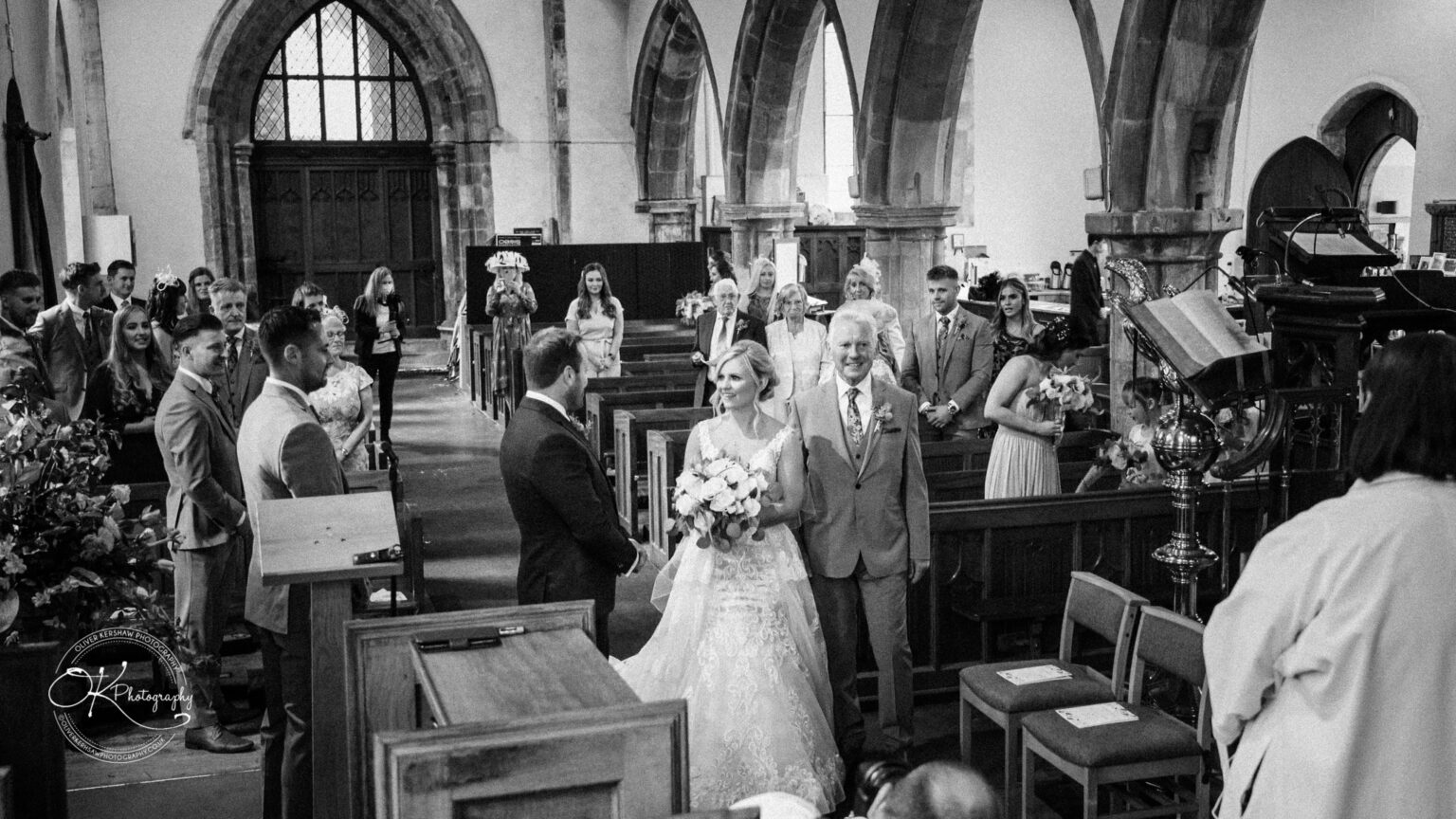 Bride and groom at the altar of St Cuthberts Church Bride and groom at the altar of St Cuthberts Church