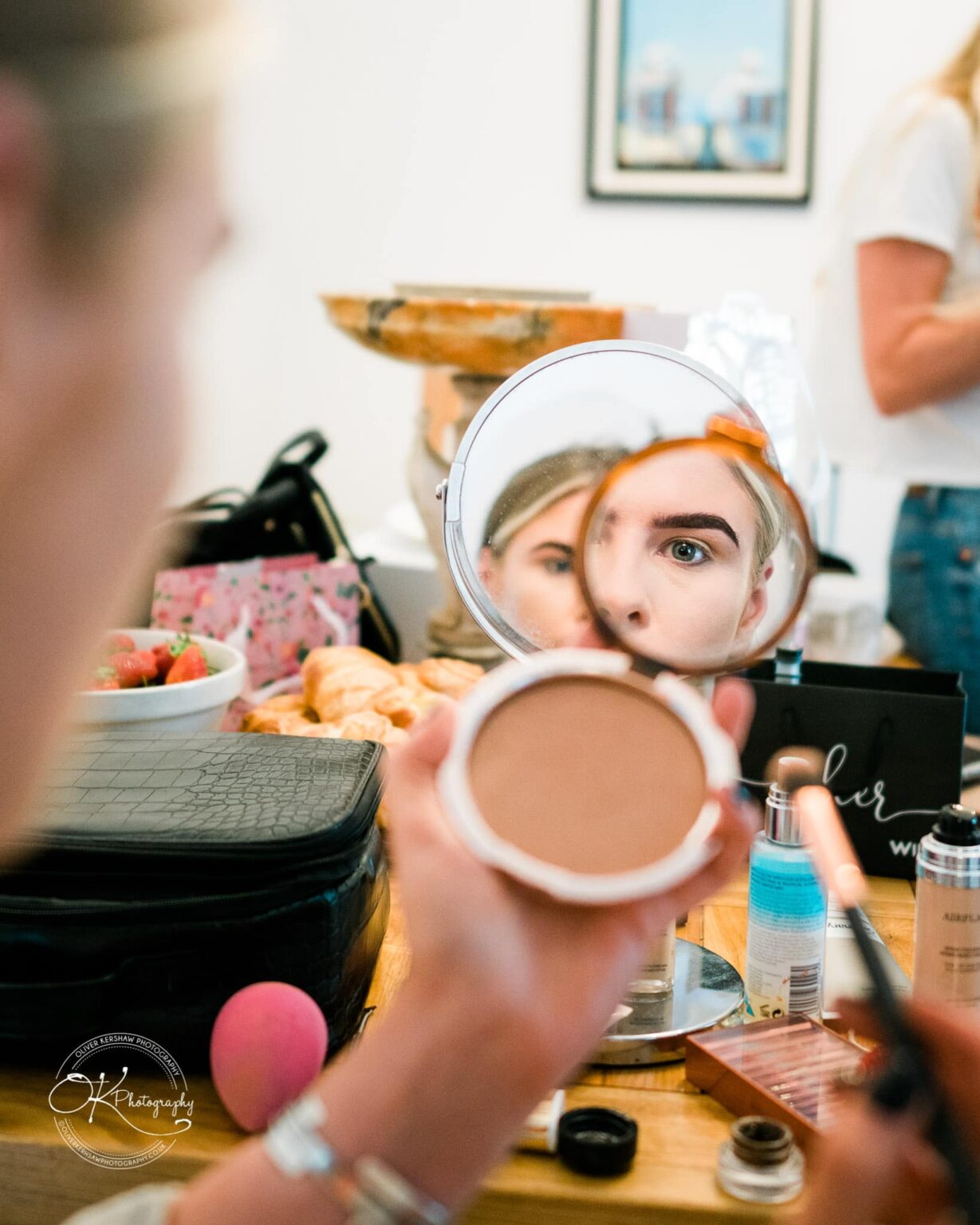 Bridesmaids make up in the mirror Bridesmaids make up in the mirror