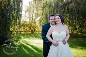 Bride and groom embrace
