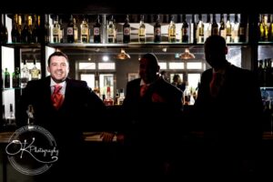 Groom at the bar