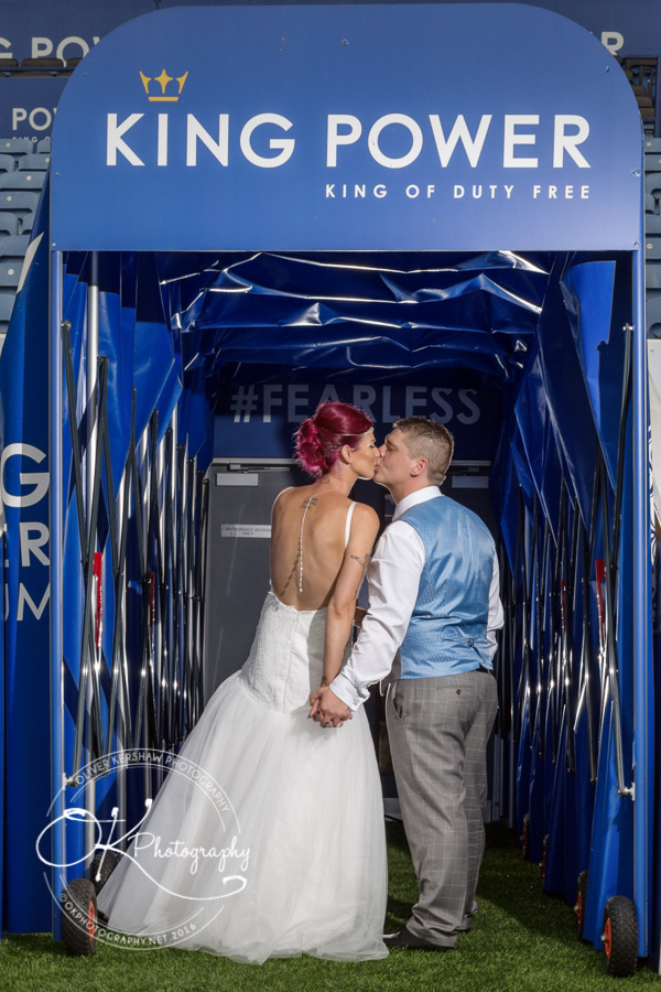 Kiss-in-the-tunnel-at-King-Power-Stadium-Wedding-by-okphotography-165252