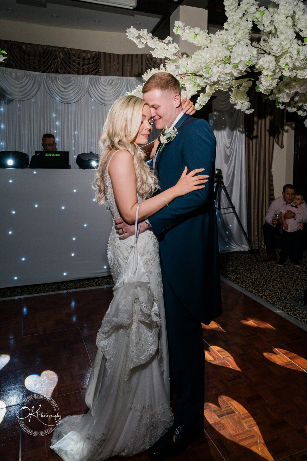 Bride and groom dancing at their wedding reception in Bosworth Hall Hotel.