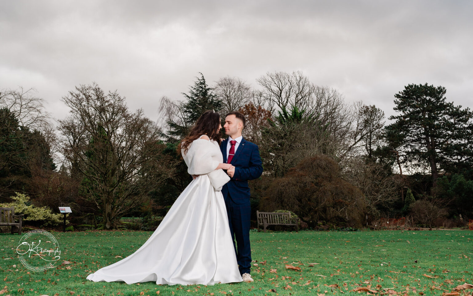 Konstandin and Bleona enjoying a joyful moment during their wedding, captured by Oliver Kershaw Photography.