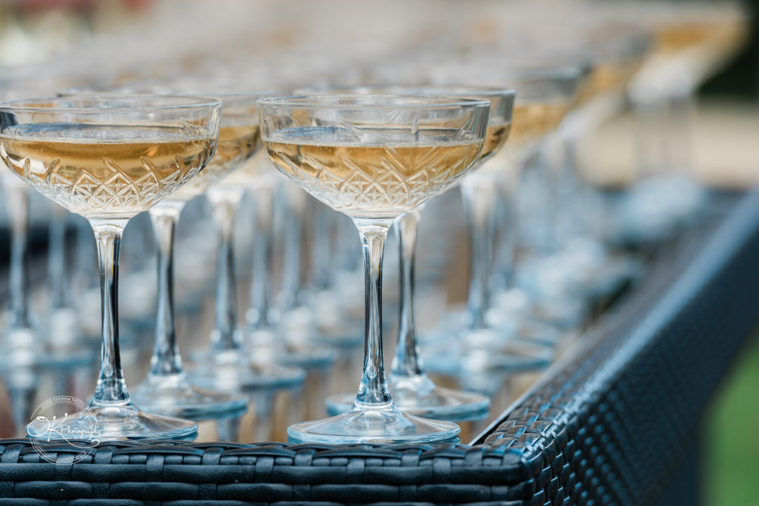 Champagne glasses lined up for wedding celebration at Prestwold Hall