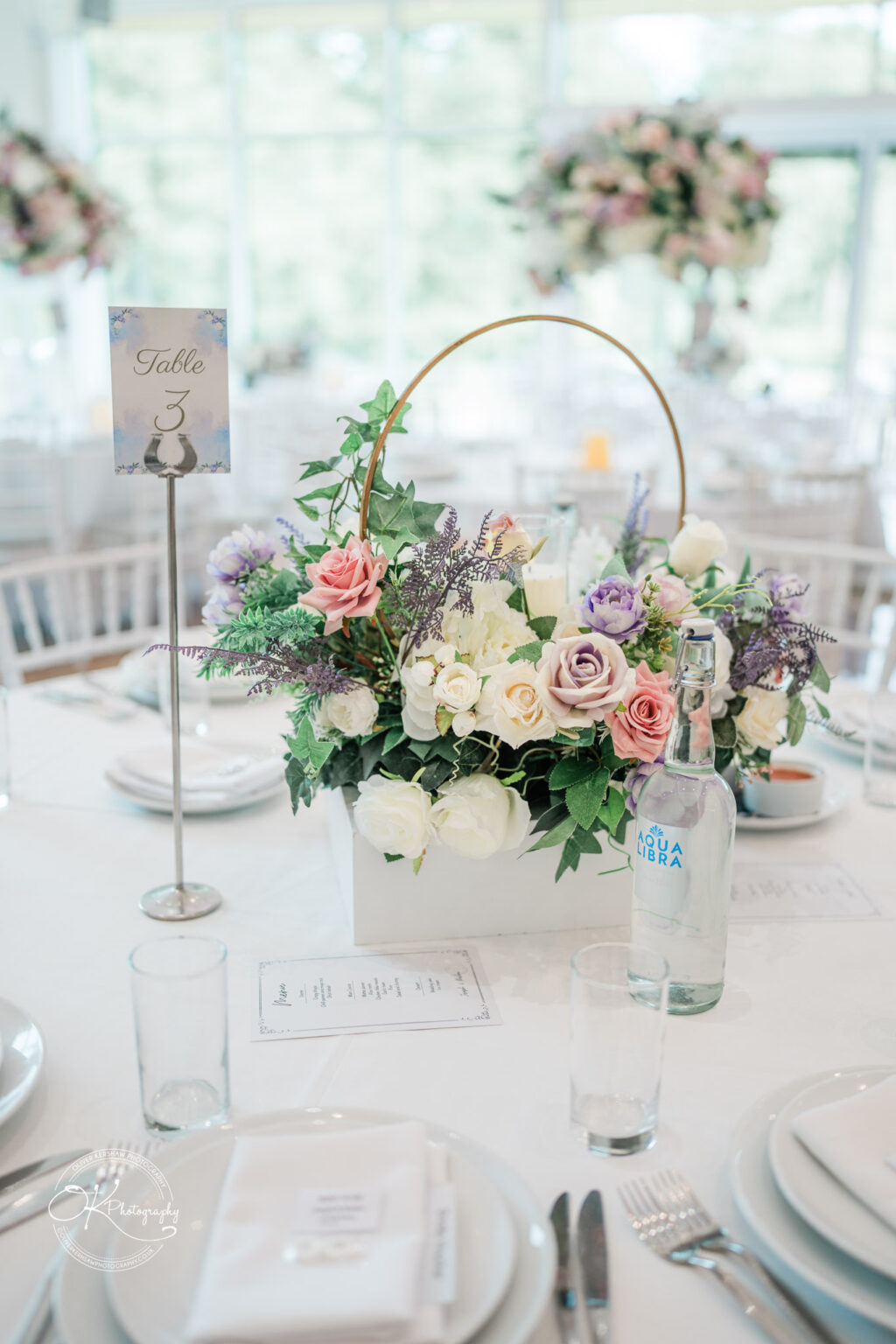 Beautifully arranged table setting at Winstanley House wedding, featuring floral centerpieces and elegant tableware.